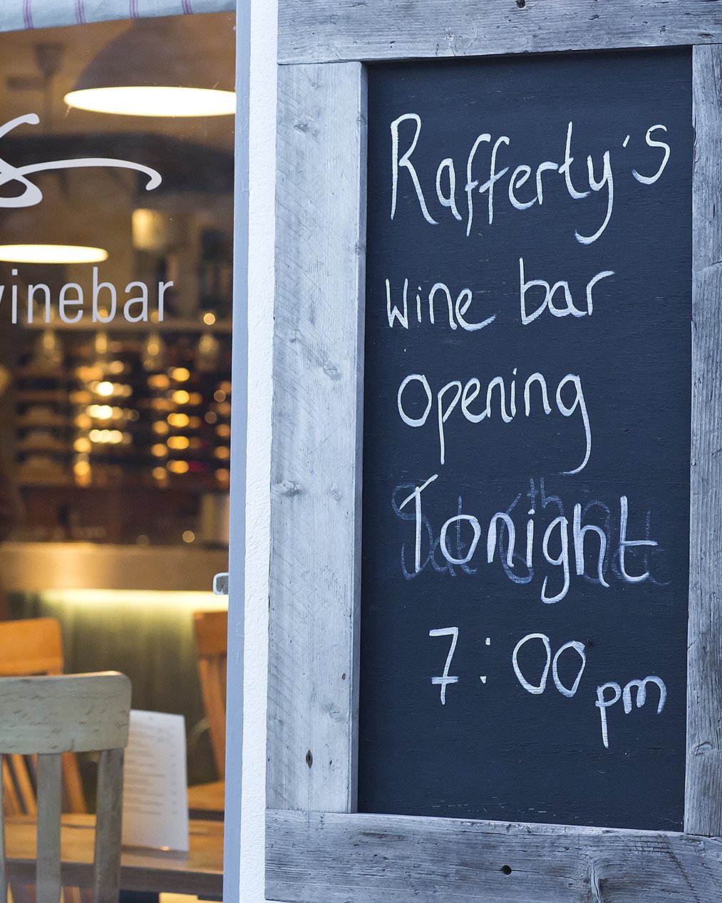 Chalkboard outside Rafferty's: wine bar opening tonight